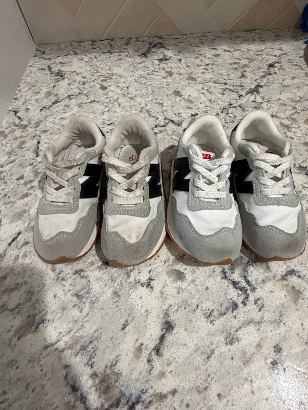 2 Pairs of New Balance 7c shoes toddler